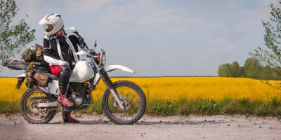 motorcyclist on off road trip enjoying the view