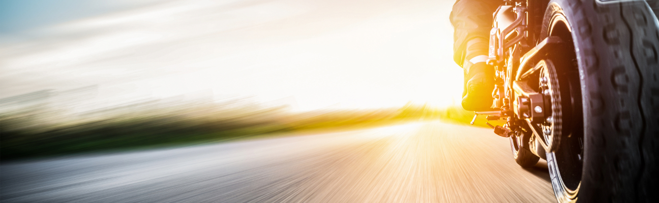 Close up of a motorcycle on road