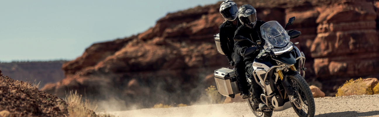 motorcyclist driving down the road