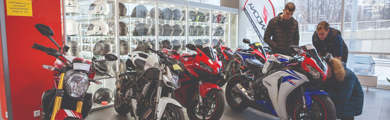 motorcycles parked in a row