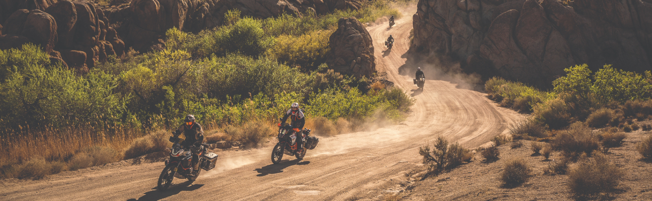 AMA Members driving down dirt path